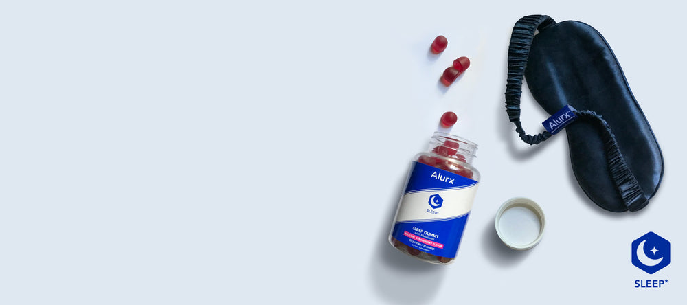 The desktop version of the home page banner used for the Alurx Sleep Collection, showing the Sleep Ritual Set: Alurx Sleep Gummy with Melatonin -pictured: bottle with gummies; and 100% silk Sleep Mask